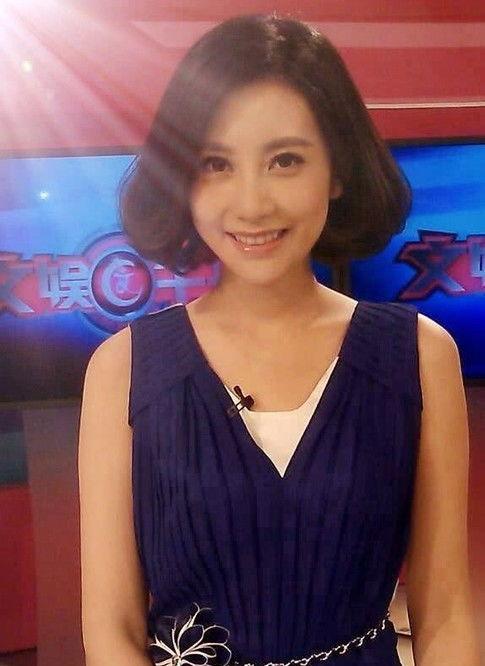 主持人晨阳橙色丝袜,丝袜映衬下的时尚风采